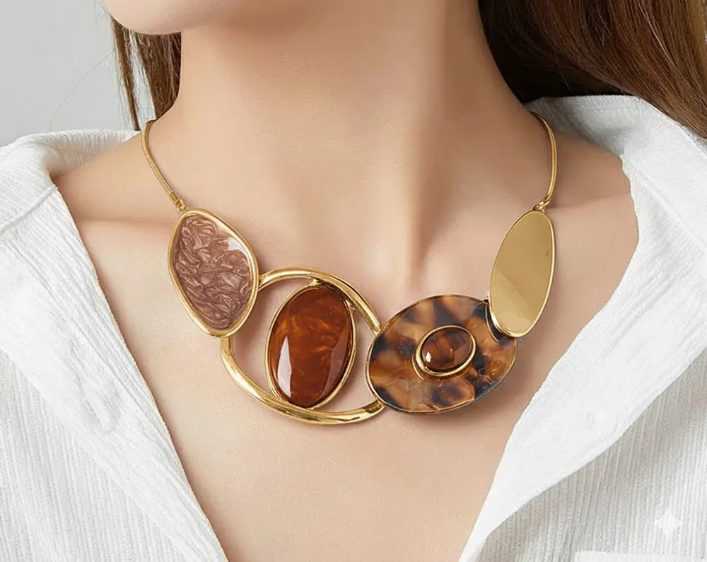 Belle-Miss-EIRENE-Brown-Enamel-Resin-Necklace-Statement-Jewelry-1A Woman wears Belle Miss EIRENE necklace with large motif, brown enameled elements and resin. Stainless steel chain, jewelry gift Cyprus.