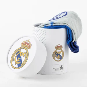 Detailed shot of the embroidered Real Madrid club crest on the high-quality fabric.