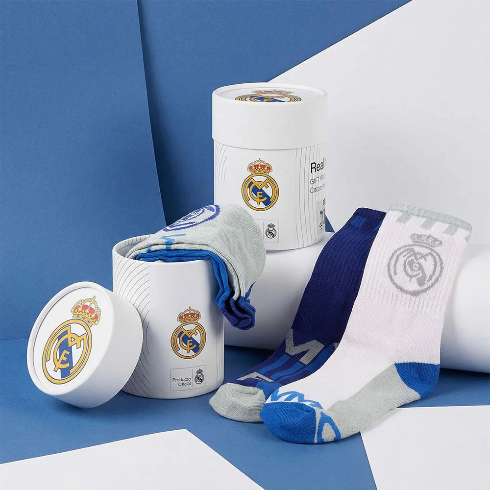 Official Licensed Real Madrid set of 3 pairs of socks in white, blue, and grey.