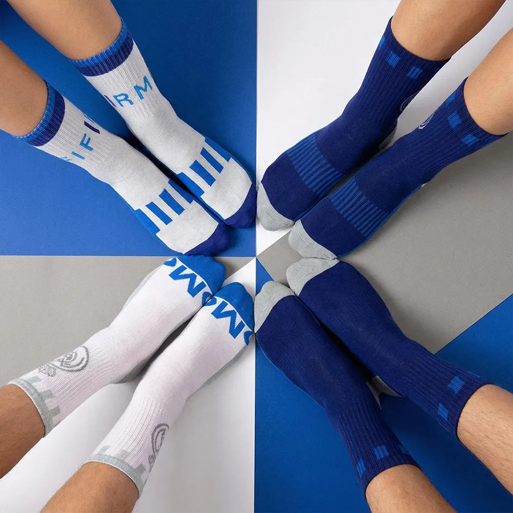 Real-Madrid-Socks-Pack-Gifts-Cyprus-7 Close-up of a fans wearing the Real Madrid official football socks with sneakers.