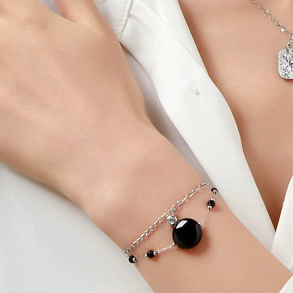 uhuru-stainless-steel-bracelet-blue-natural-stones Woman Wears Uhuru Stainless Steel 2-Row Chain Bracelet with Blue Natural Stones – Enchanted Beauty Talisman