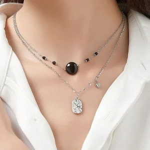 Woman Wears Uhuru Double Strand Stainless Steel Necklace with Tinted Natural Stones – Enchanted Beauty Talisman
