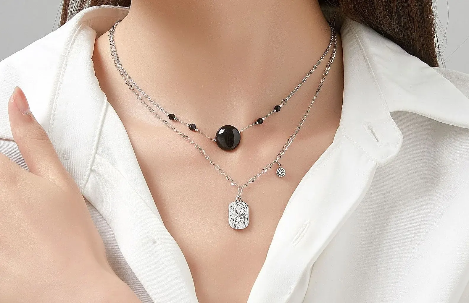 Woman Wears Uhuru Double Strand Stainless Steel Necklace with Tinted Natural Stones – Enchanted Beauty Talisman