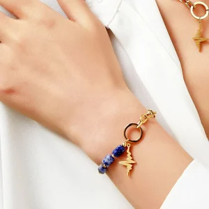 Woman Wears Ursina Gold-Plated Steel Chain Bracelet with Lightning Bolt Motif & Natural Stones Blue