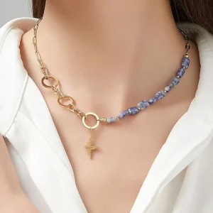 Woman Wears Ursina Gold-Plated Steel Chain Necklace with Lightning Bolt Motif & Blue/Black Natural Stones Blue